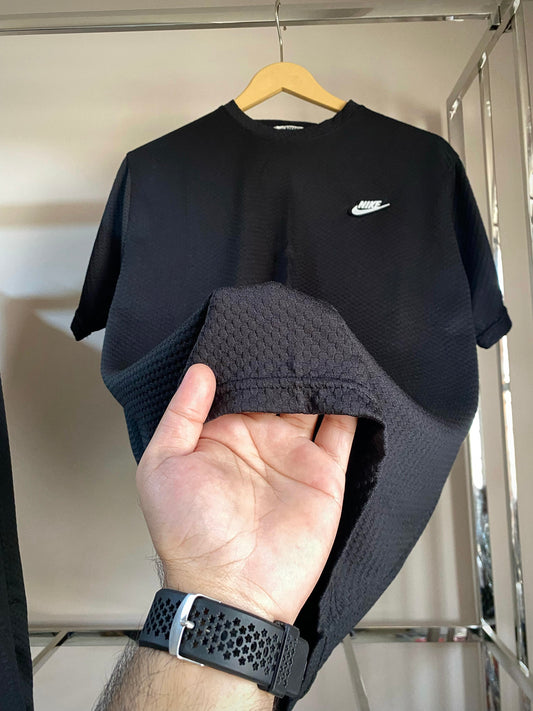 N-i-k-e black tee shirt